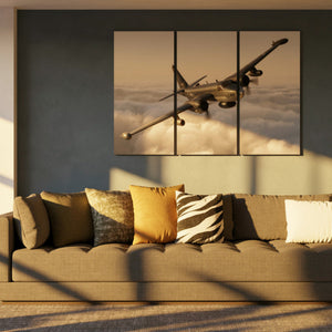 Sofa with decorative pillows in a room with a large wall art of a P2V airplane flying over clouds.