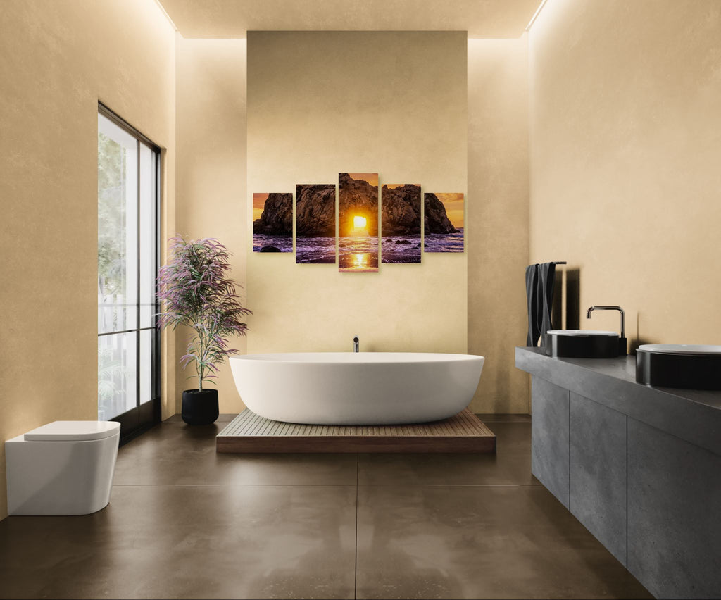 Modern bathroom with a freestanding bathtub, wall art, and large windows.