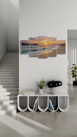 Modern interior with a wall art piece of a beach sunset and a white console table.