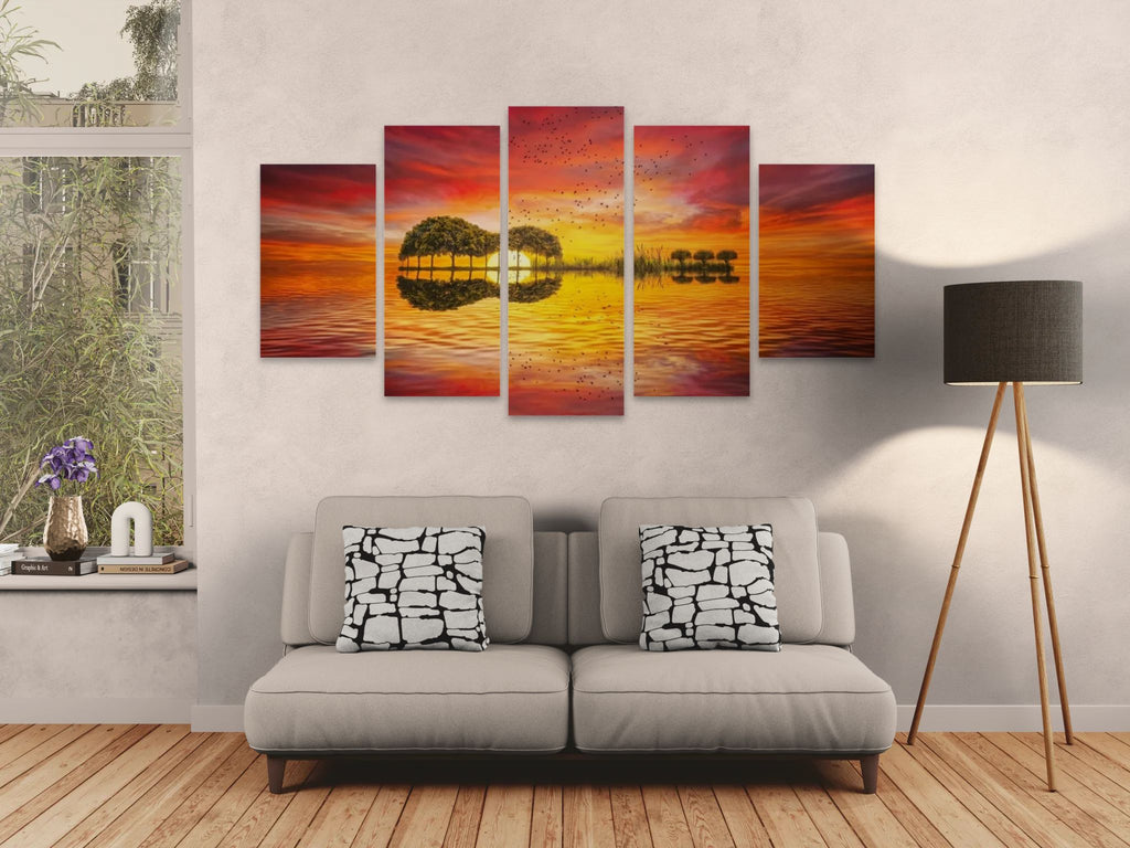 Living room with a gray sofa, decorative pillows, and a wall with a large guitar abstract painting.