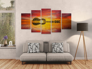 Living room with a gray sofa, decorative pillows, and a wall with a large guitar abstract painting.