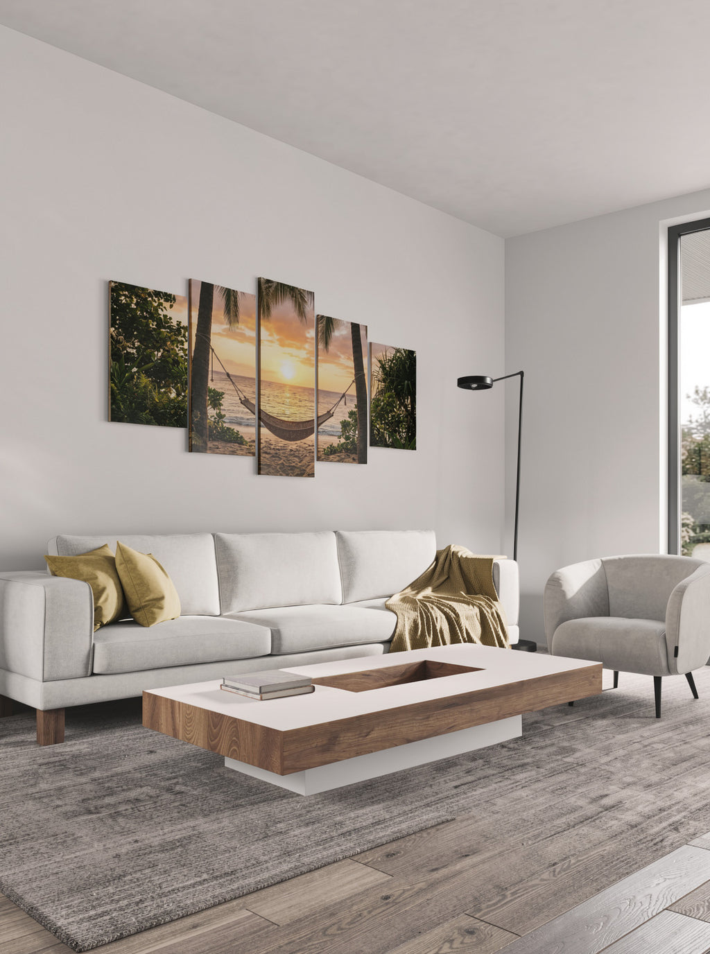 Modern living room with a white sofa, wooden coffee table, and wall art depicting a sunset.