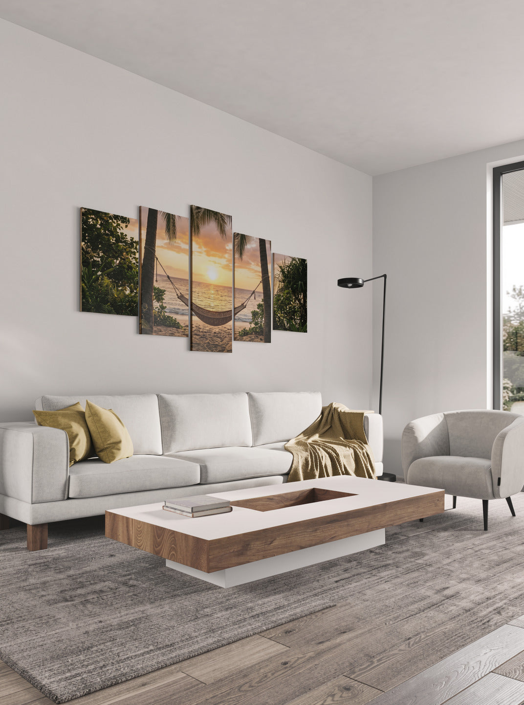 Modern living room with a white sofa, wooden coffee table, and wall art depicting a sunset.