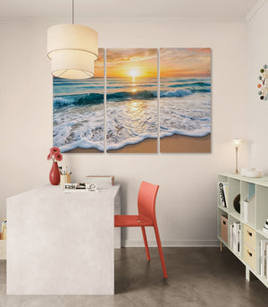 Modern interior with a desk, red chair, and large beach scene wall art.