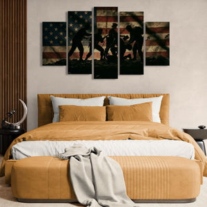 Bedroom with a large bed and wall art featuring silhouettes and an American flag.