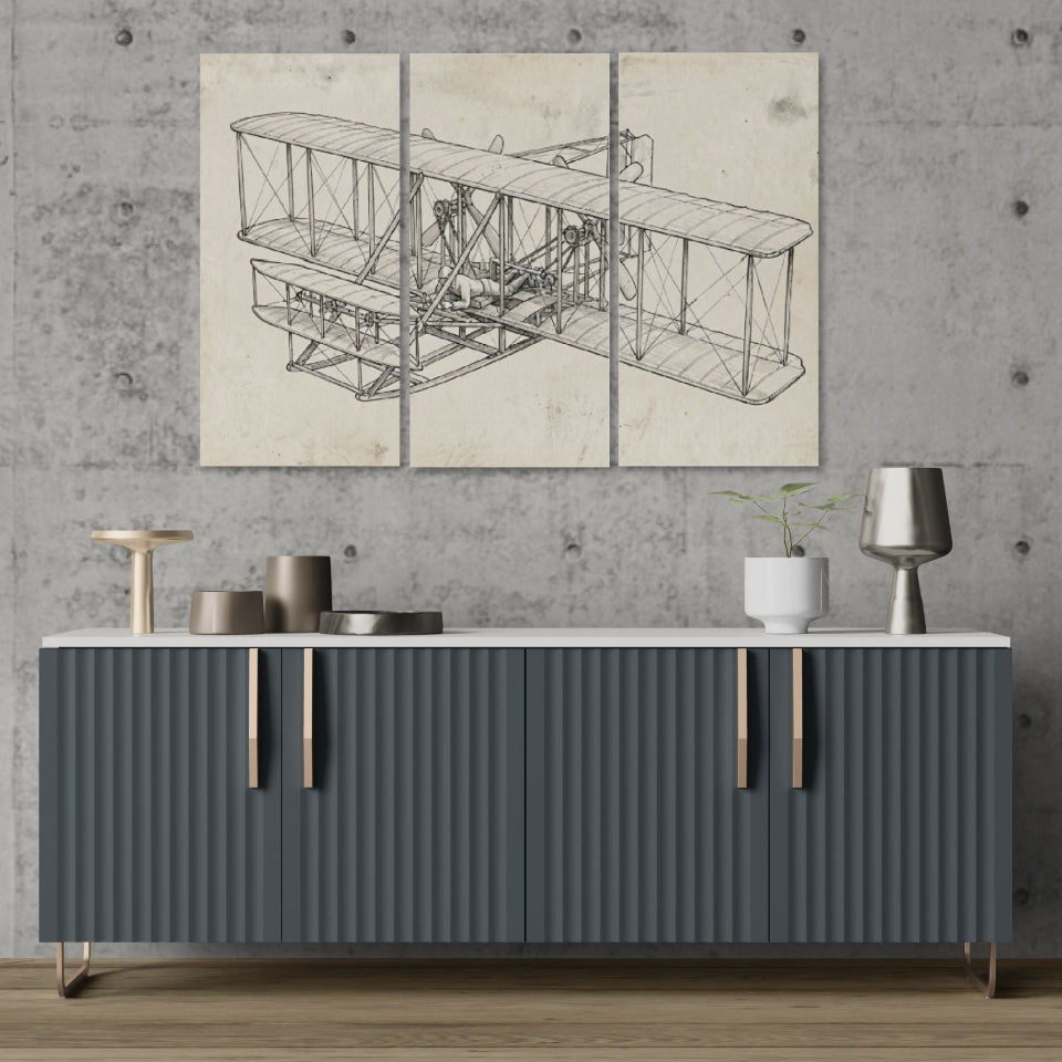 Modern interior with a gray sideboard, decorative items, and a large Wright Brothers airplane blueprint on the wall.