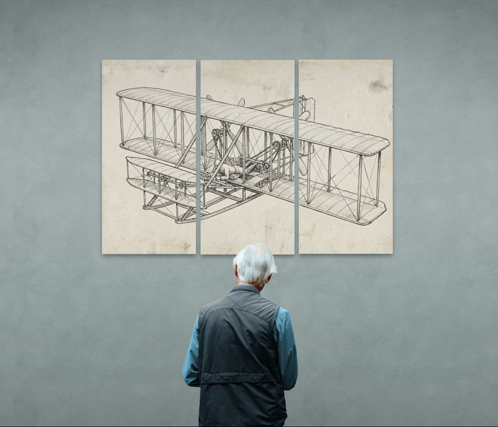 Man looking at a large vintage Wright Brothers airplane blueprint on a wall